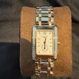 Longines Longines DolceVita L5.155.5.19.7 Rose gold and Stainless steel White