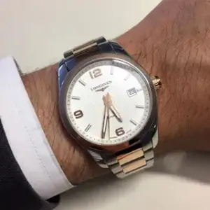 Longines Longines Conquest L2.785.5.76.7 40mm Rose gold and Stainless steel Silver