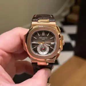 Patek Philippe Patek Philippe Nautilus 5980R-001 40.5mm Rose gold Brown