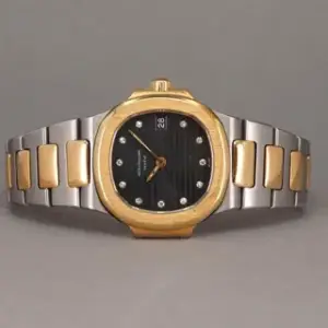 Patek Philippe Patek Philippe Nautilus 4700/1 27mm Yellow gold and Stainless steel Black