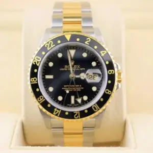 Rolex Rolex GMT-Master II 40mm Yellow gold and Stainless steel Black
